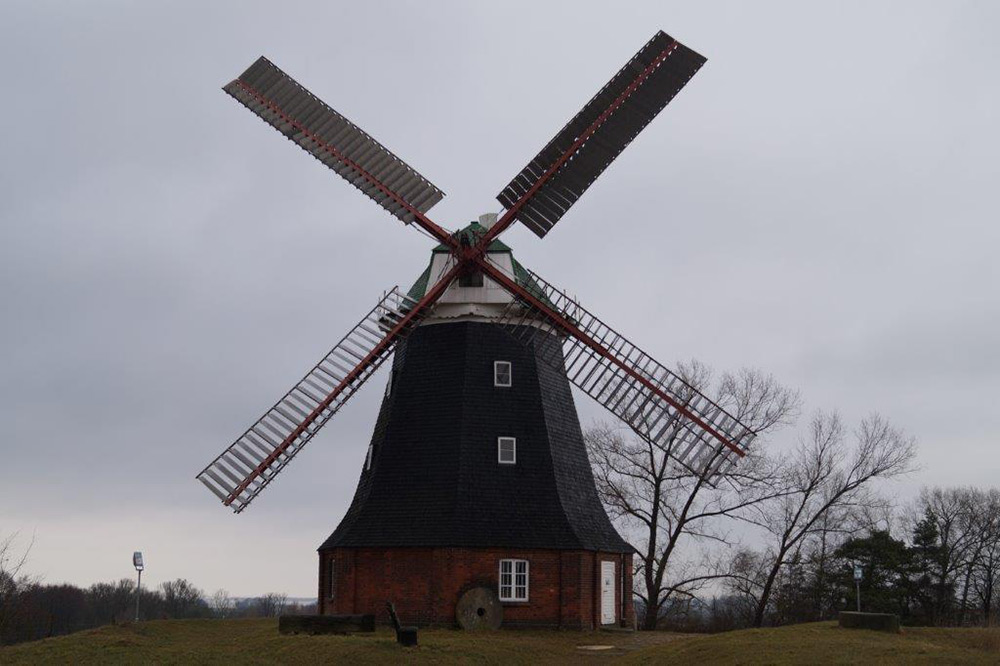 Holländermühle arbeiten an Dach/Flügel/Fenster